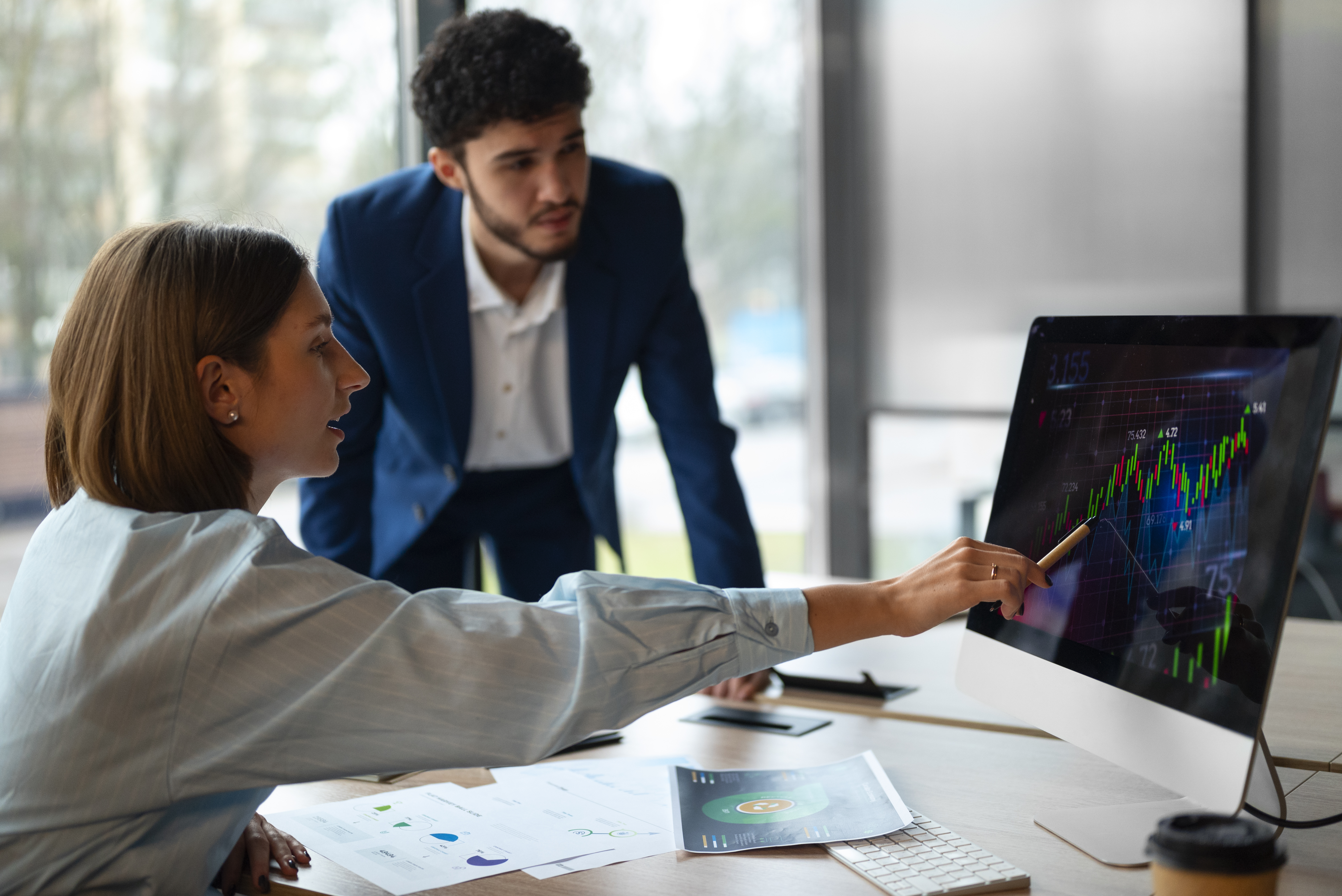 Analyst reviewing risk dashboards
